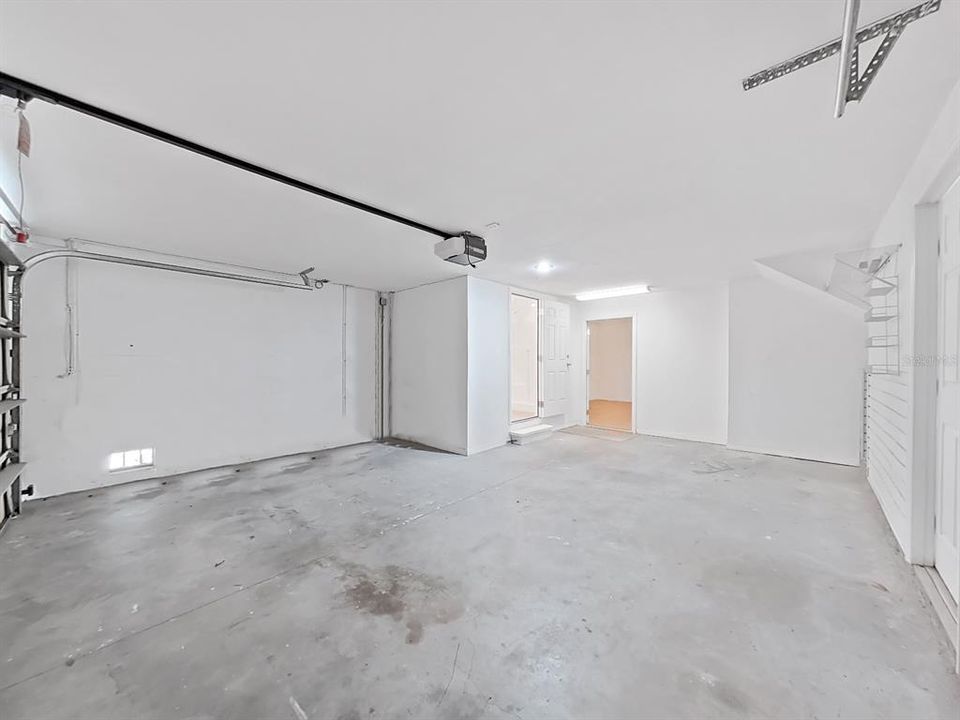Garage with Bathroom and door to Bonus Room
