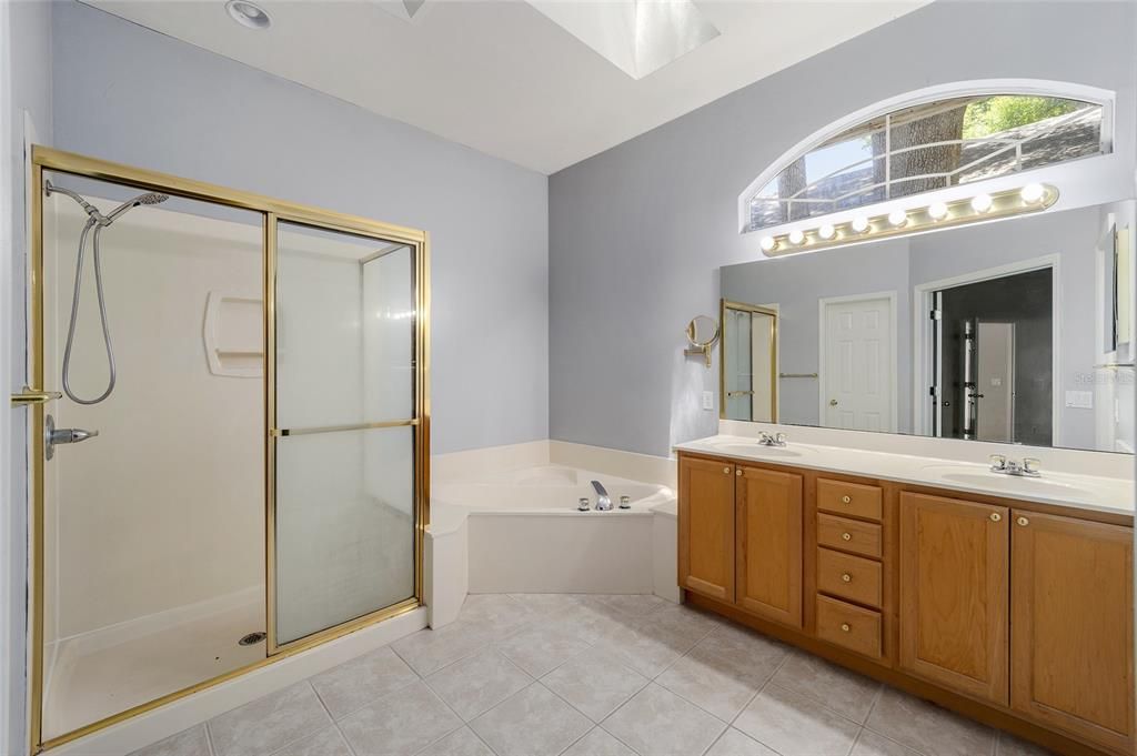 OWNER'S BATH WITH GARDEN TUB, SHOWER AND SEPARATE WATER CLOSET