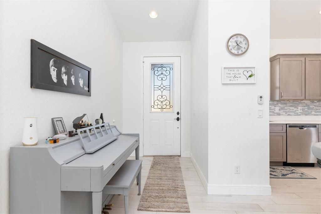 With stunning plank tile welcoming you, this meticulous home features an open floor plan with all of the modern conveniences you expect in a newer built home.