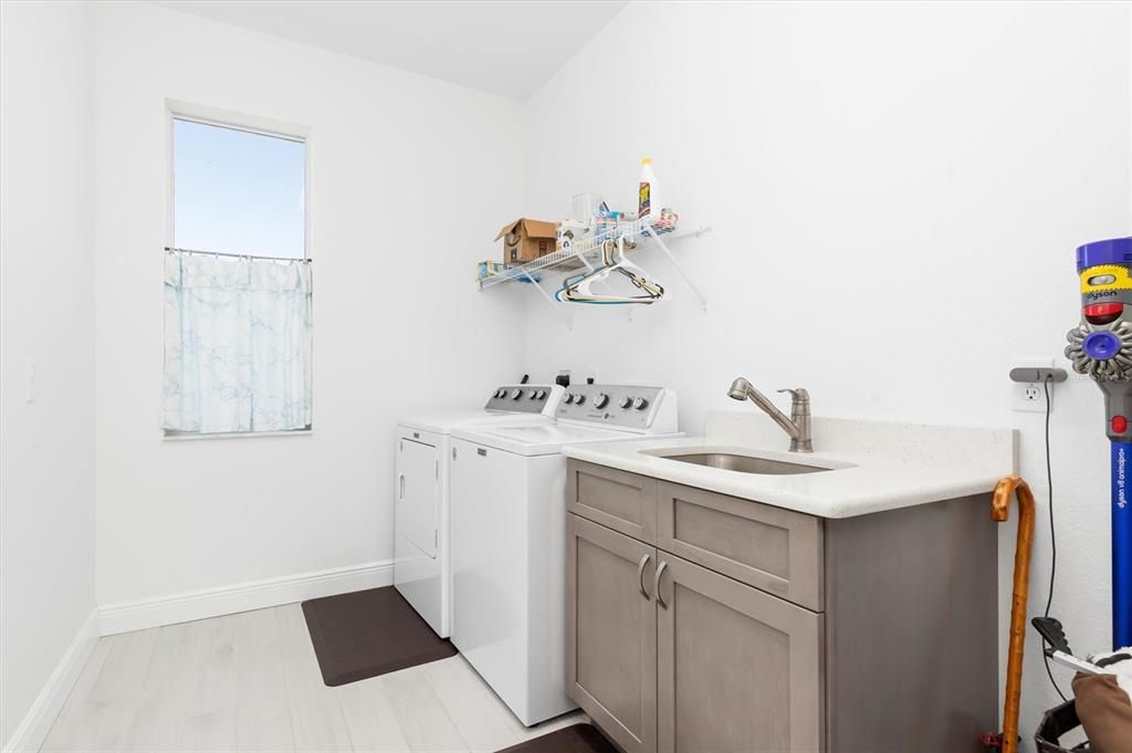 Your interior laundry room is oversized, providing ample space for storage or other accessories you may want to add.