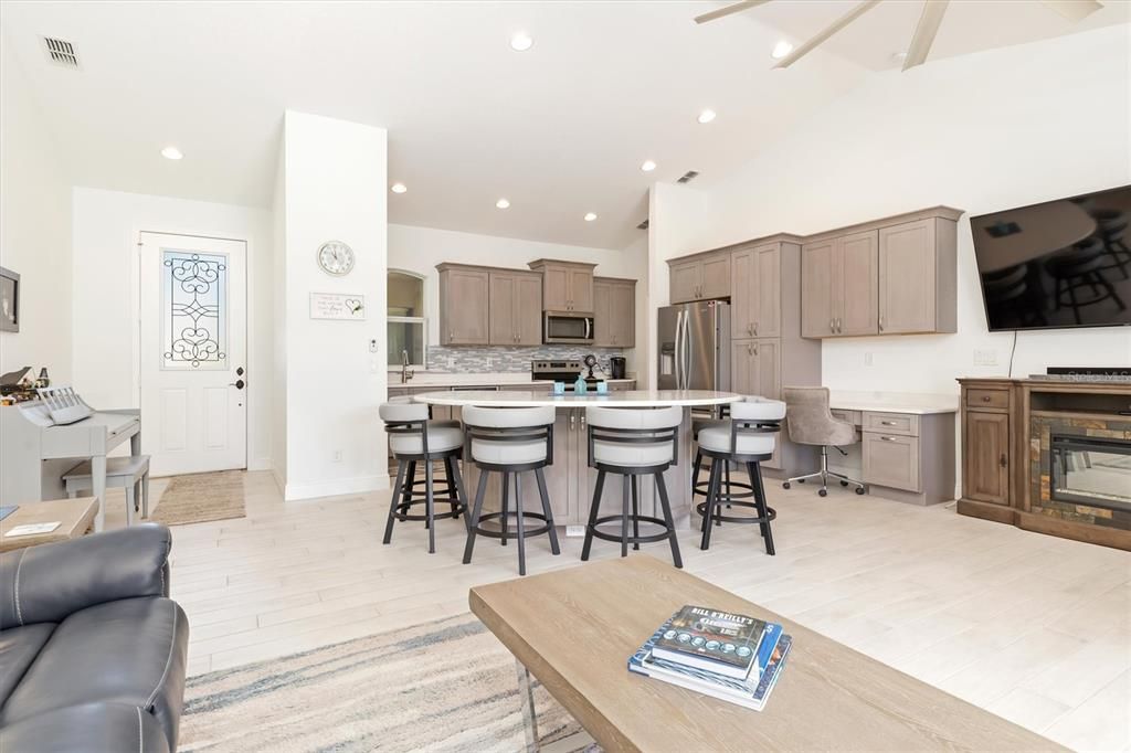 They say the kitchen is the heart of the home - enjoy interacting with your family and guests around this large custom dining island (with extra lower cabinet storage).