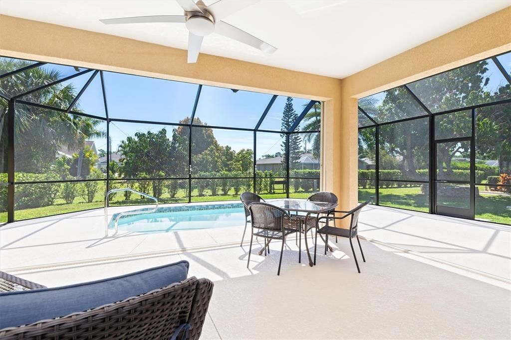 Enjoy your large covered lanai leading to the refreshing heated pool and outdoor space - perfect for entertaining!