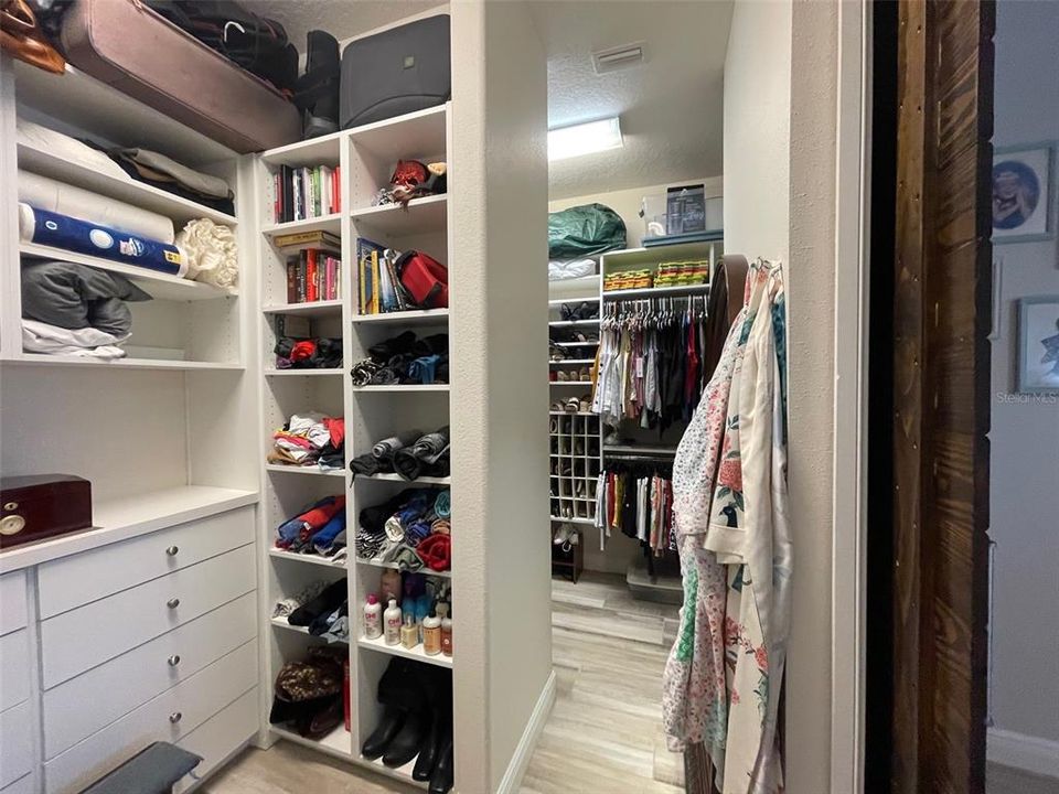 Other side of primary walk in closet