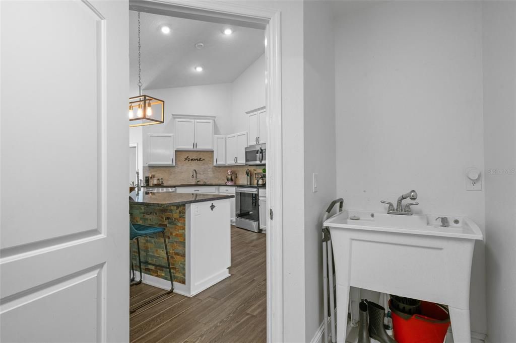 Laundry room washtub/ view to kitchen