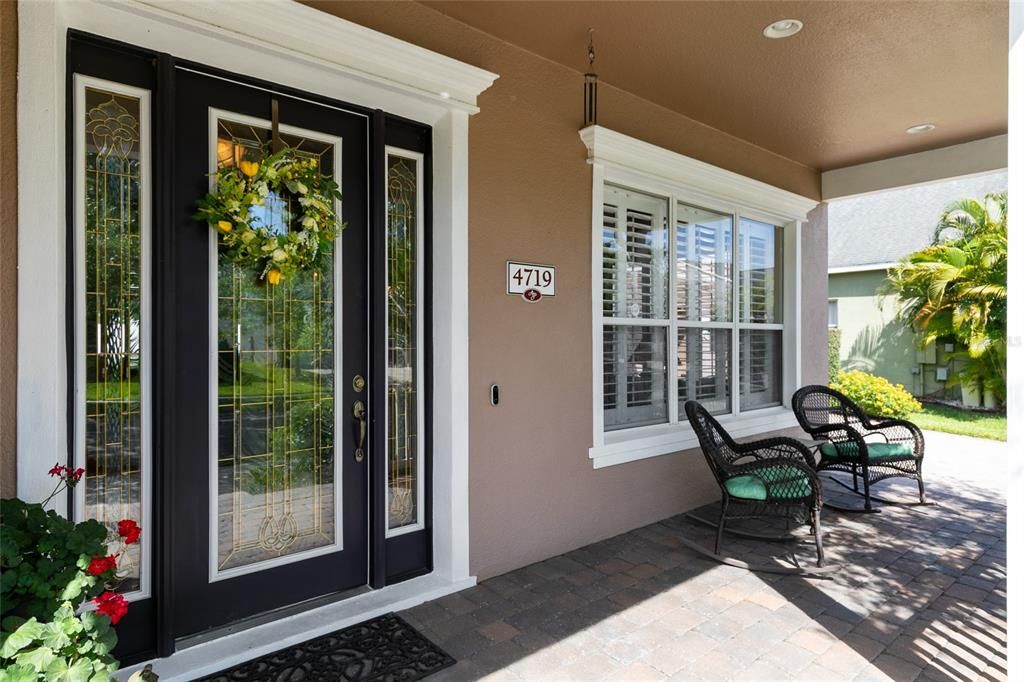 Beautiful and open front porch area perfect for enjoying your morning coffee while you experience the open green scenery!