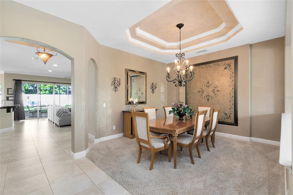 To your right is the generous sized formal living & dining room & features carpet with an open floor plan which is perfect for entertaining guests!