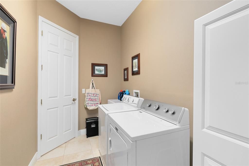 Laundry room includes washer and dryer.