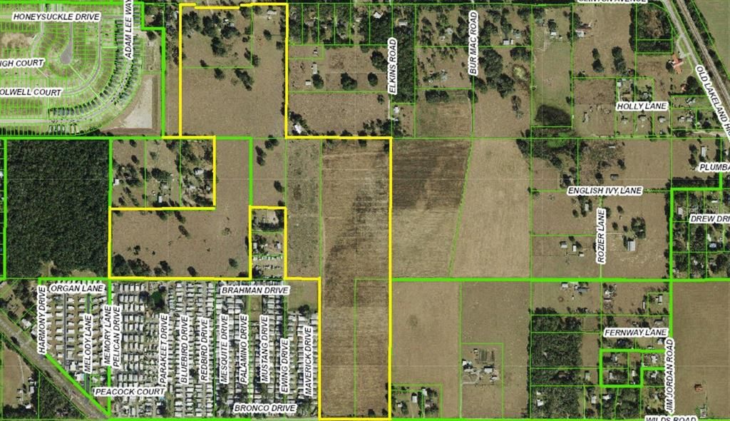 Aerial plat map with property boundary highlighted