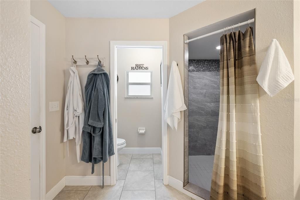 Primary water closet and shower