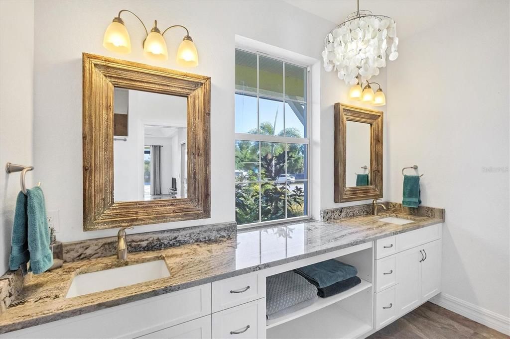 Master Bath is complimented with dual sinks, granite & a walk in shower