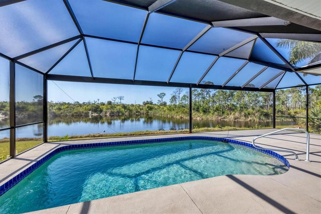 Relax in your private pool overlooking lake with conservation land behind