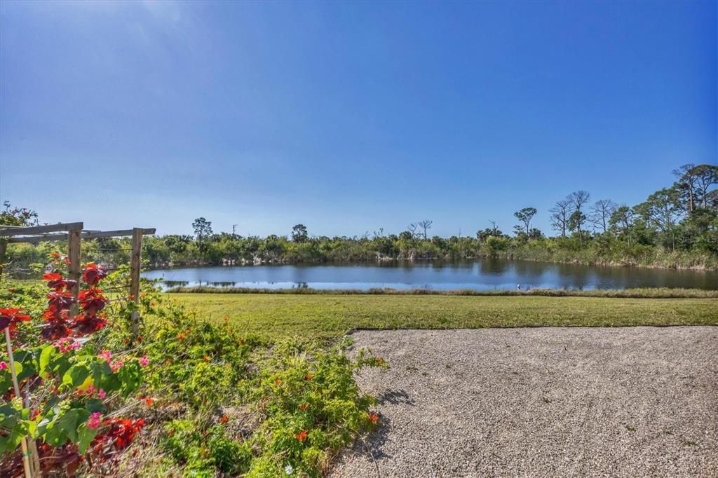 Double lot offers extra privacy and has a lake behind