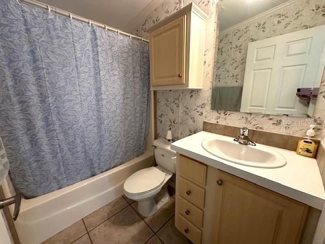 TUB AND SHOWER IN HALL BATH