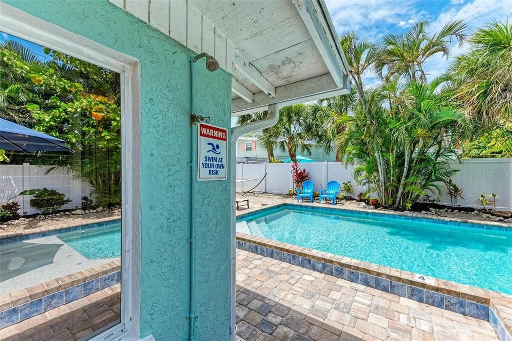 A short walk  to the beach and four houses away from the Anna Maria Island Trolly stop.