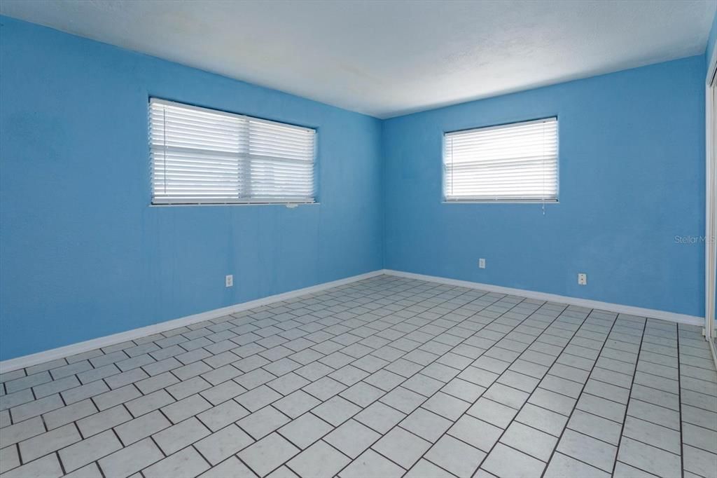 Primary bedroom is 12 x 15 with tile floors