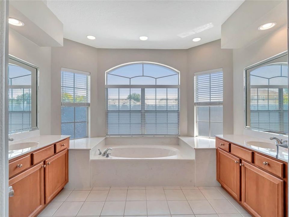 Master Bathroom with separate vanities, soaking tub and separate shower