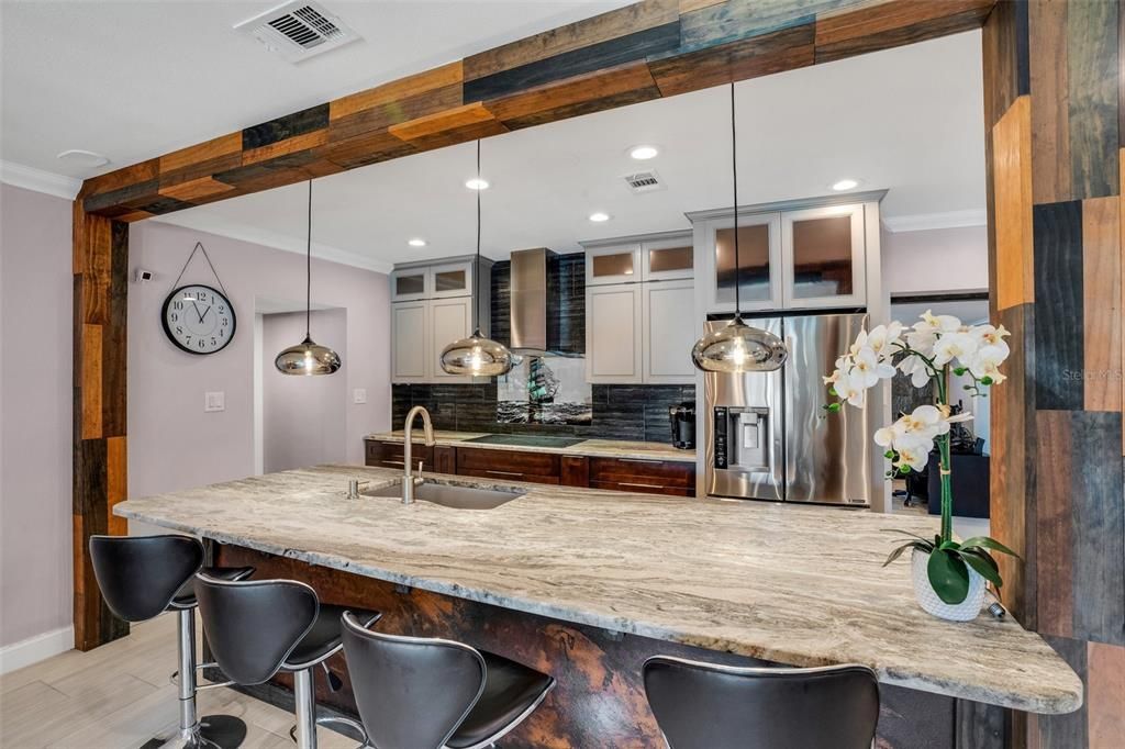 Sit Down Dining Bar at Chef's Kitchen.  Entire home has matching Granite Countertops