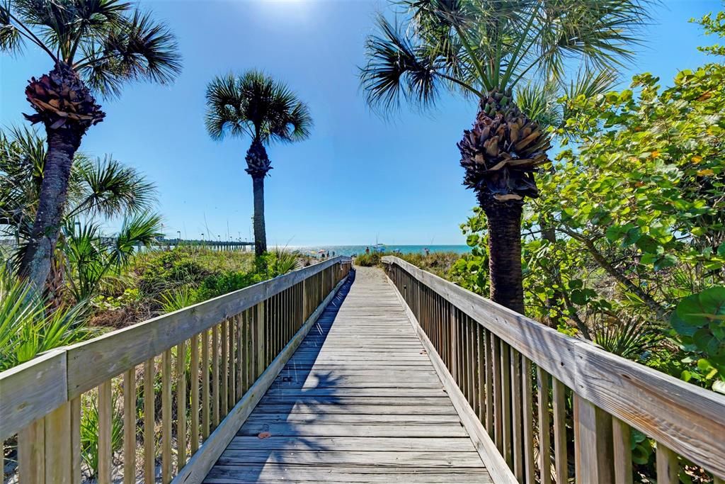 The boardwalk to the beach from Fins and Sharkeys