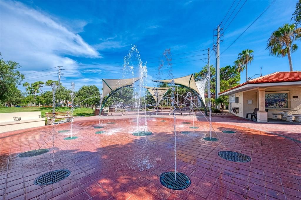 The splash pad welcomes big and small to cool down