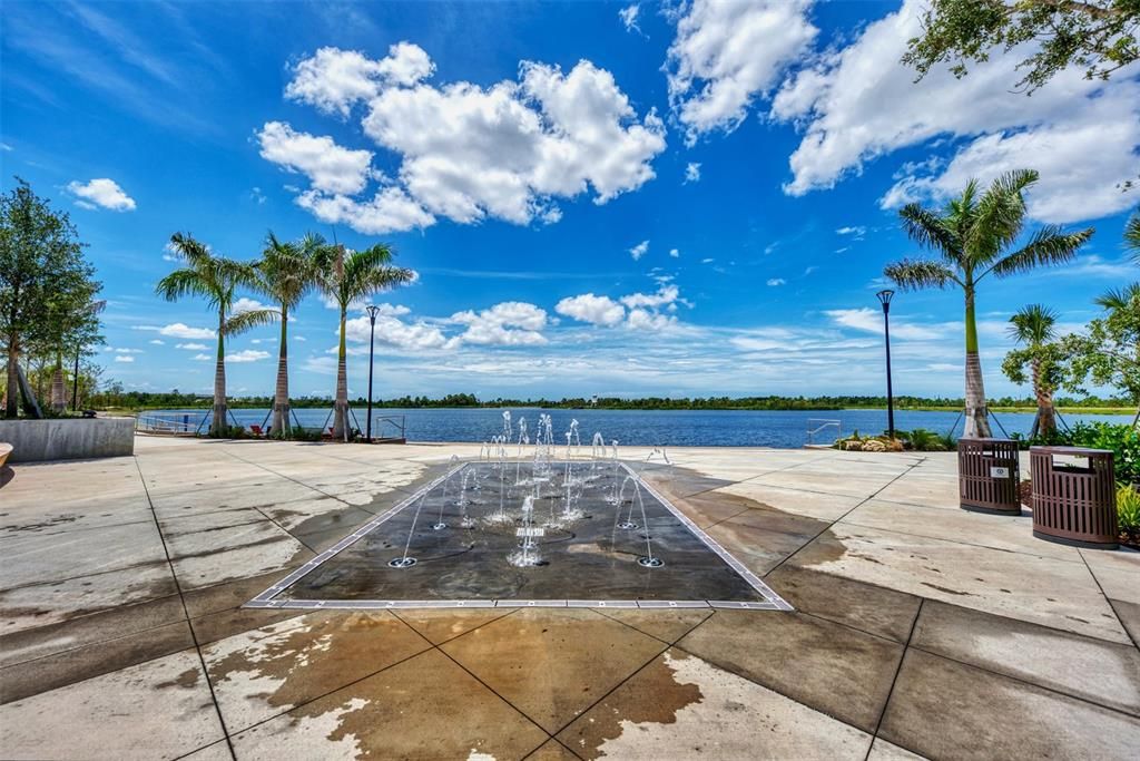 The splash pad welcomes the littles and the bigs