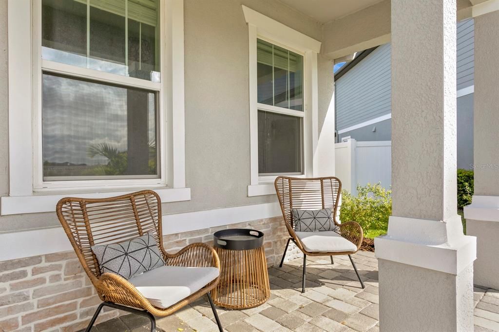 Be greeted at your new home with an outdoor front patio.