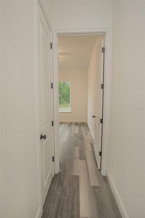 Hall to guest room and linen closet