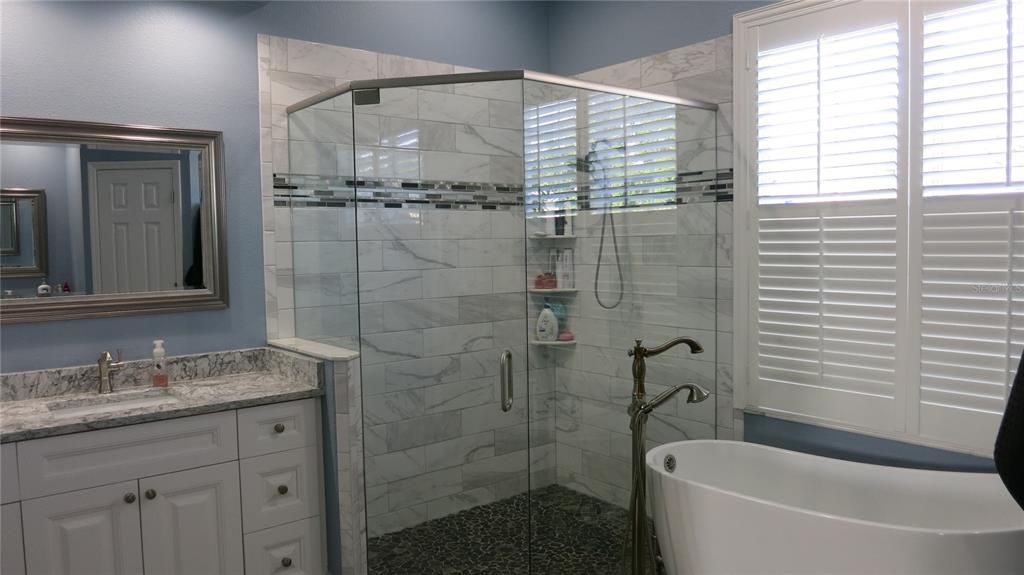 Second Vanity, Spacious Walk-In Shower and Relaxing Soaking Tub
