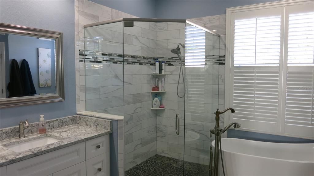 Second Vanity, Spacious Walk-In Shower and Relaxing Soaking Tub