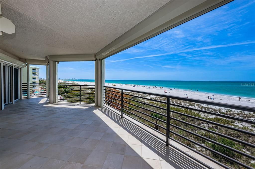 Spanning beach and Gulf View frontage from your oversized balcony.