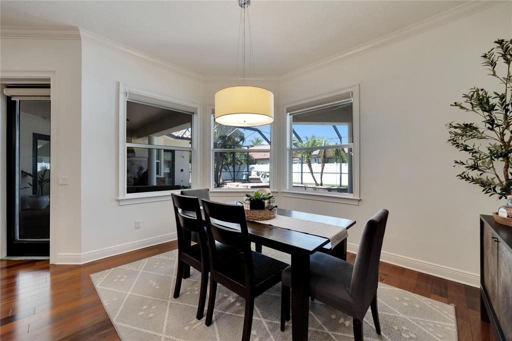 Breakfast nook with views of back patio