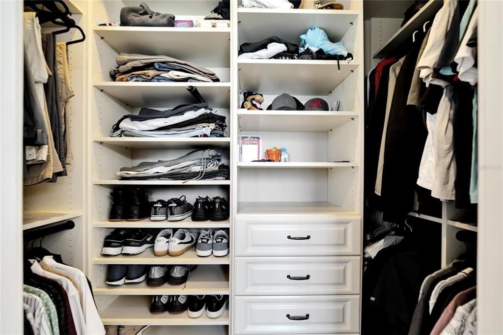 Slightly smaller 'His' Closet with custom shelving