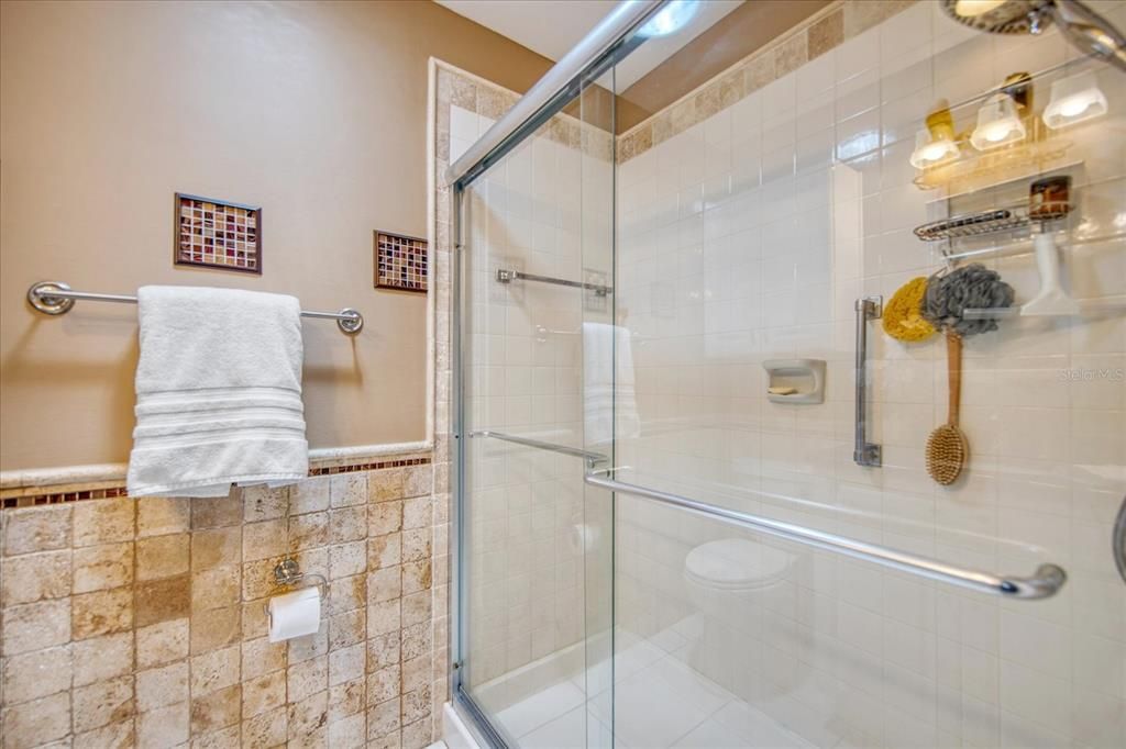 Step in shower with sturdy glass doors~