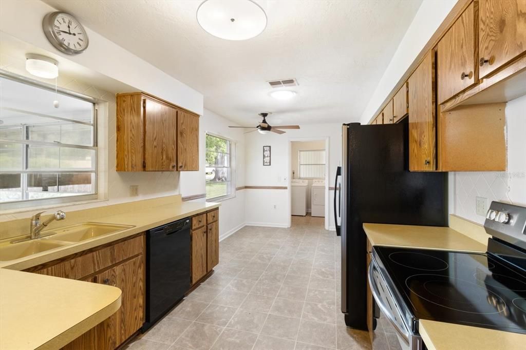 Kitchen has Plenty of Cabinetry and Countertop Space & a Peninsula with Extra Storage