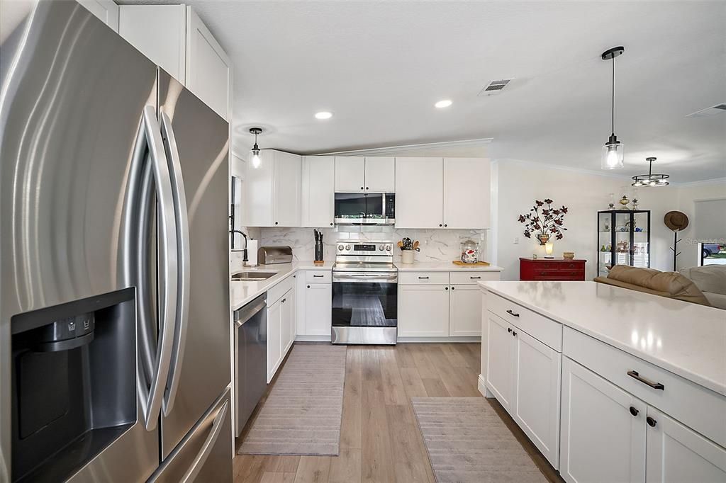 Gorgeous finishes. Shaker style cabinetry, Quartz counters, stainless appliances.