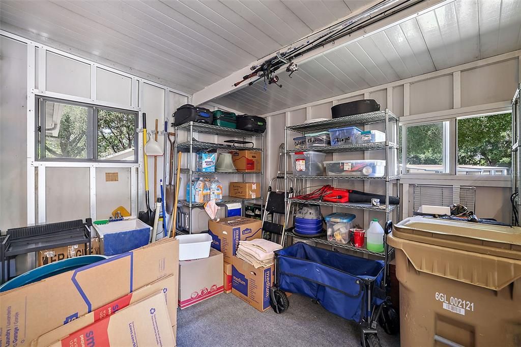 Interior of golf cart garage currently being used as a workshop.