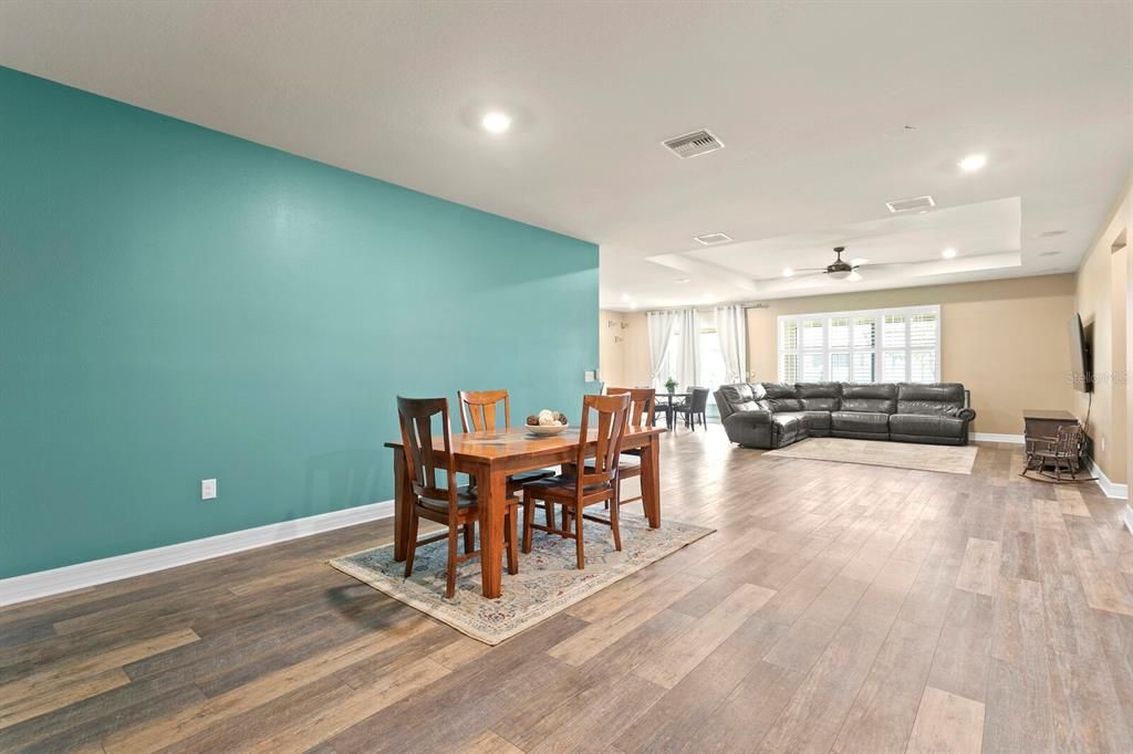 You'll find beautiful luxury vinyl plank wood flooring throughout the main living areas of the home