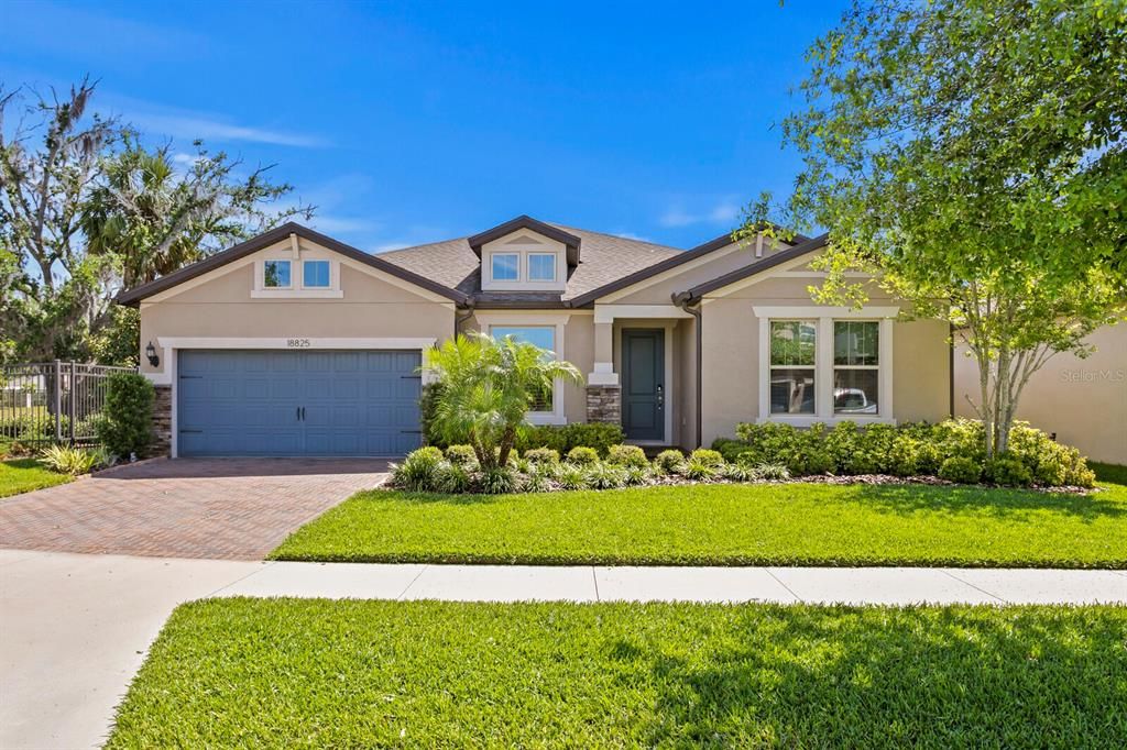 Welcome home to 18825 Birchwood Groves Dr in beautiful Lutz, FL