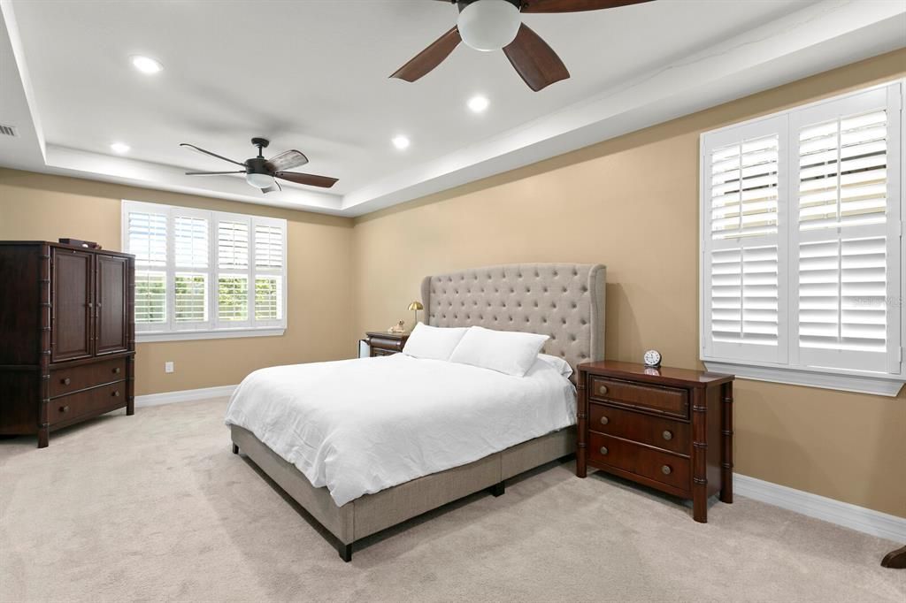 The huge master suite is tucked away at the back corner of the home for ultimate privacy