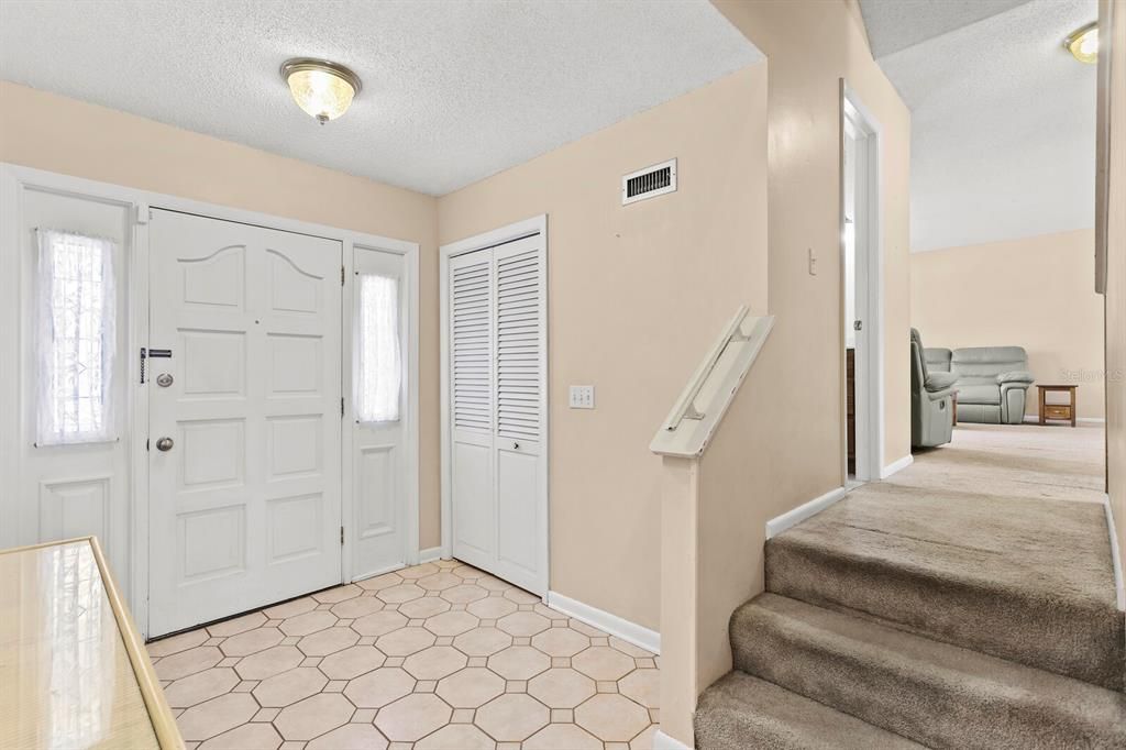 Entry leads into a spacious foyer