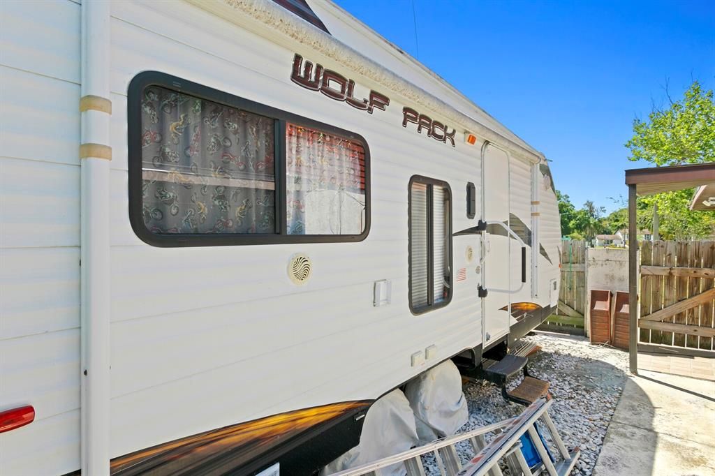 Store your boat or RV on the spacious side-yard parking pad