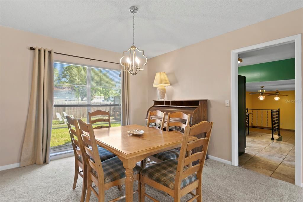 Dining room is located right off the kitchen