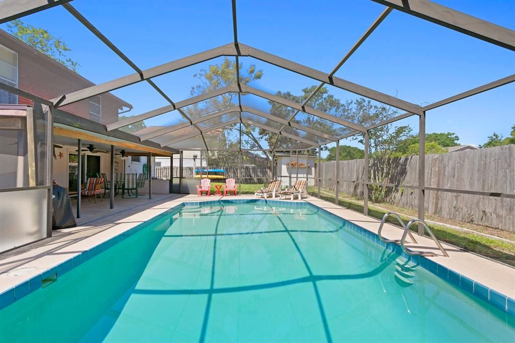 At nearly 1,400sqft, the screen enclosed pool and lanai make for the perfect outdoor space