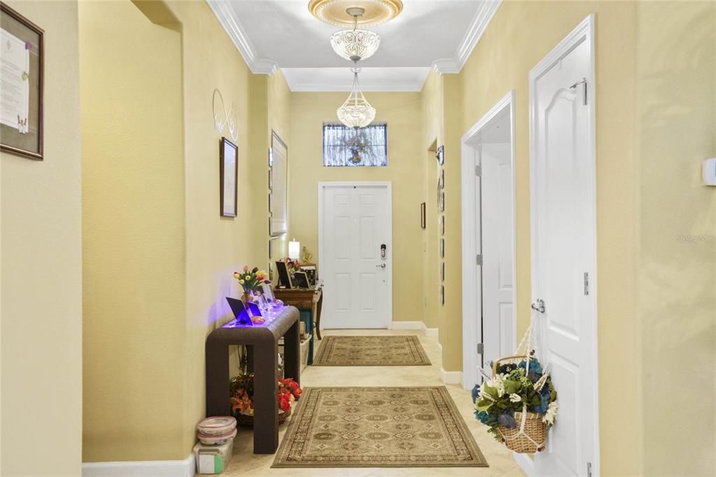 Foyer features a smart lock entrance and transom window