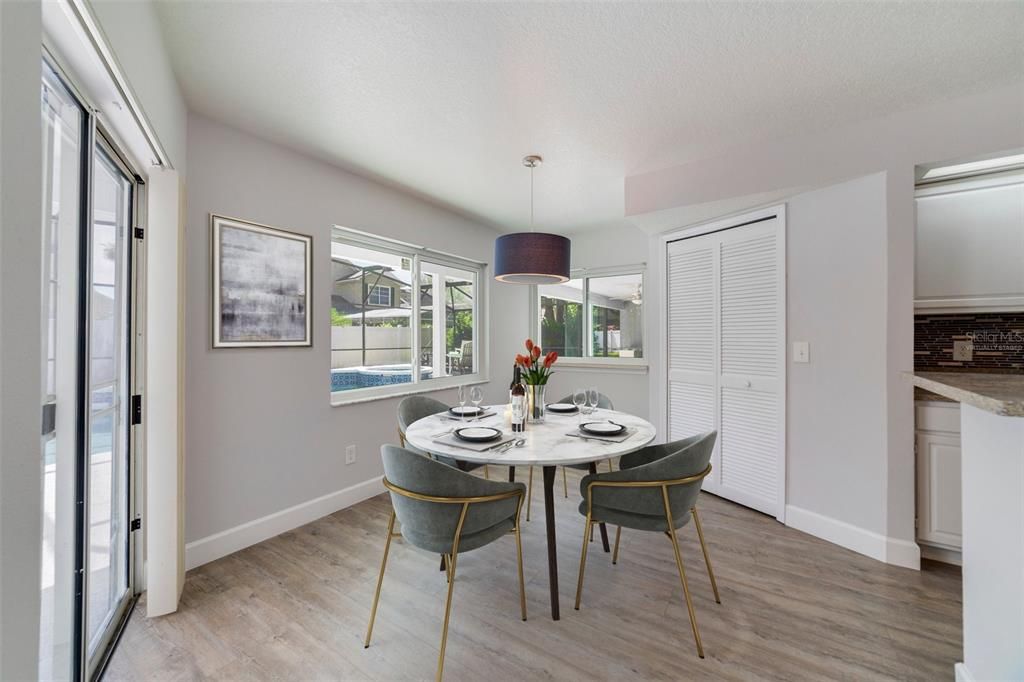 Just off the kitchen there is a second dining area for casual meals with family and friends. Virtually Staged.