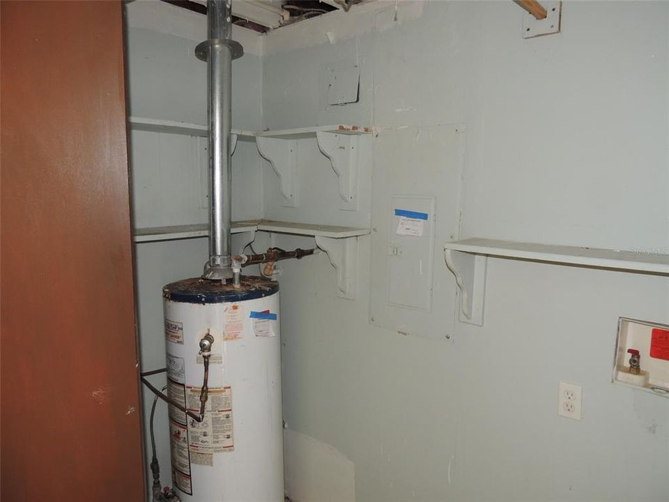 Gas Water Heater in Laundry Room in Enclosed Garage
