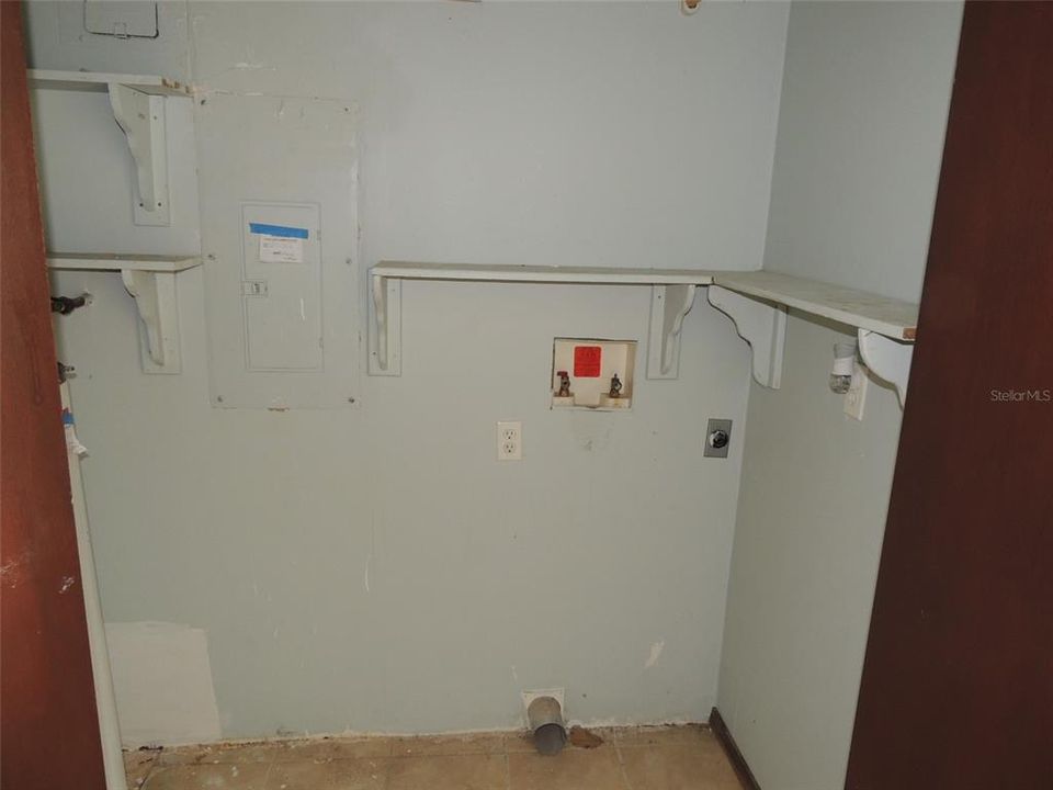 Laundry Room in Enclosed Garage