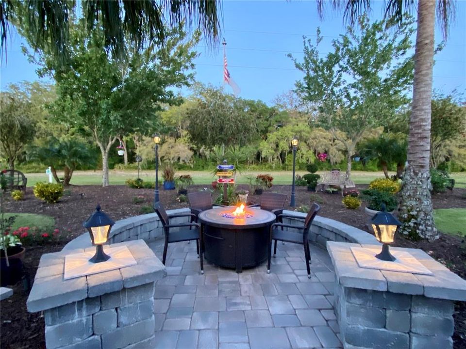 Outdoor fire pit and solar lighting in your own private garden setting