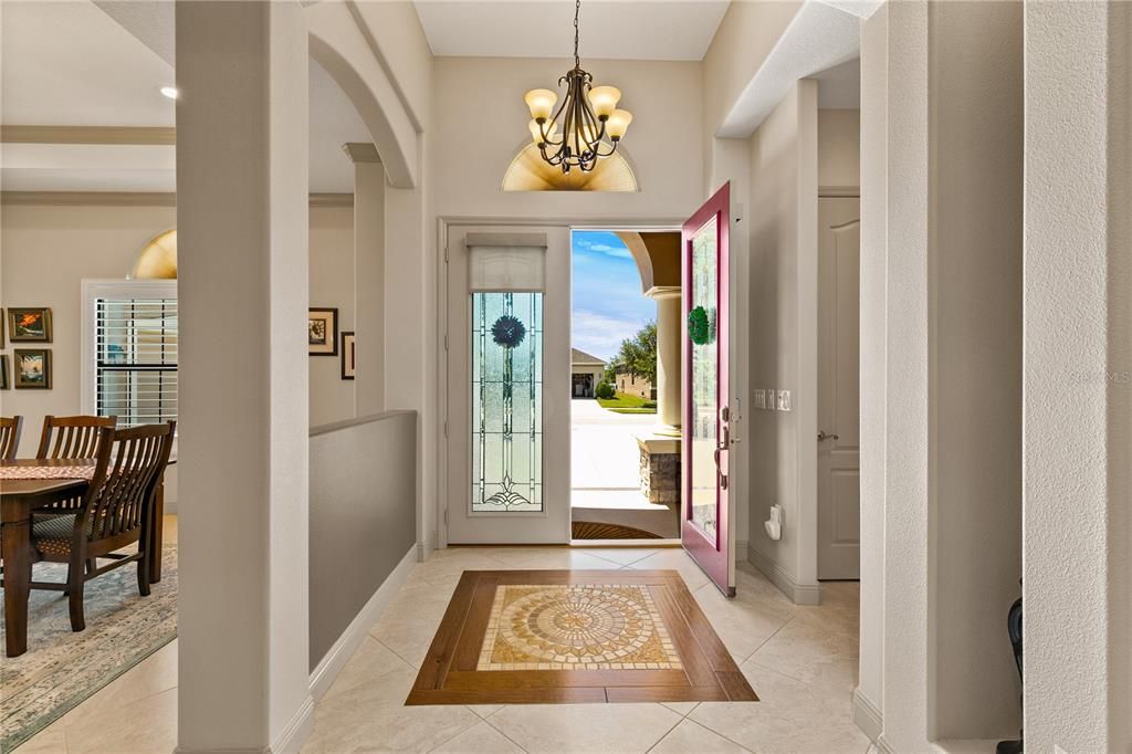 Foyer with custom floor/doors, looking out