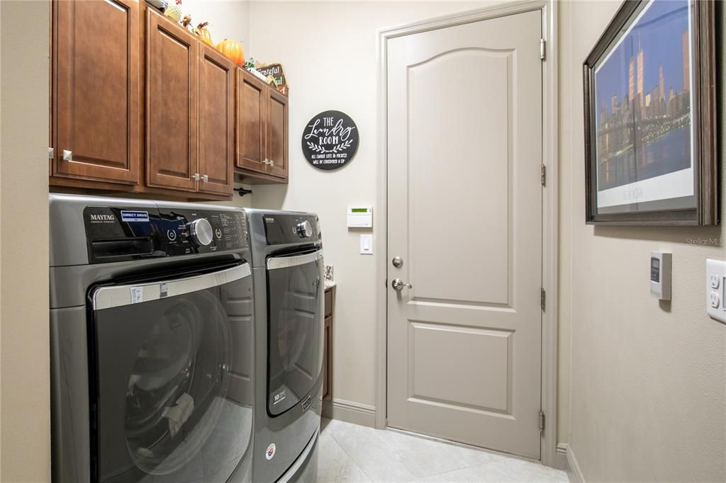 Laundry with Commercial Maytag washer/dryer