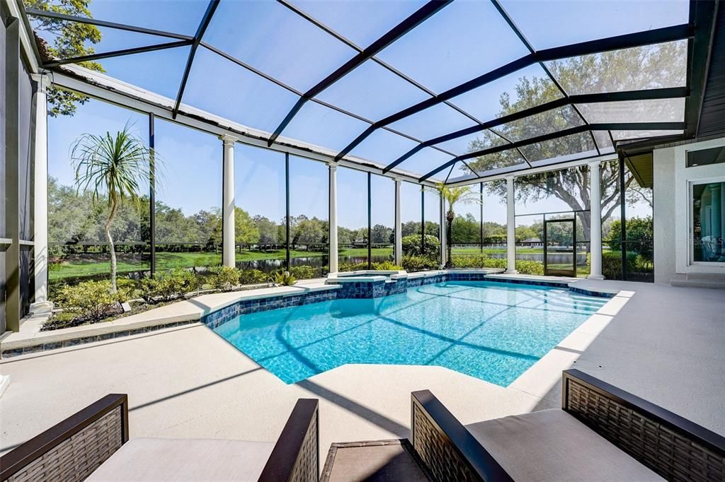 Relax on the covered lanai, cookout in the Summer kitchen or spend the day in your heated pool and spa - all screened for maximum comfort with optimum privacy!